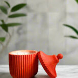 Redpersimmon candle with lid on marble