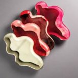 Colorful abstract decorative catchall trays stacked