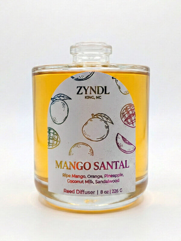 Mango-scented reed diffuser bottle