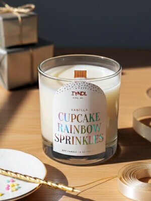 Cupcake-scented candle with decorations.