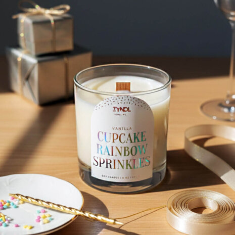 birthday cake scented candles Cupcake-scented candle with decorations.