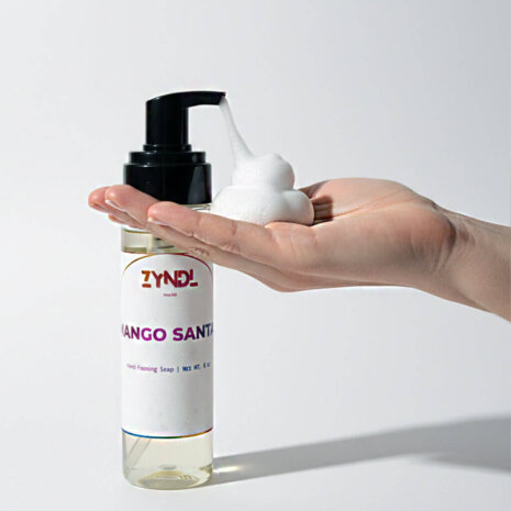 coconut mango hand soap Foaming mango hand soap in hand