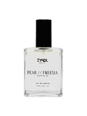 Bottle of pear and freesia perfume
