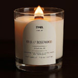 Burning candle with elegant label. oud candle and diffuser set