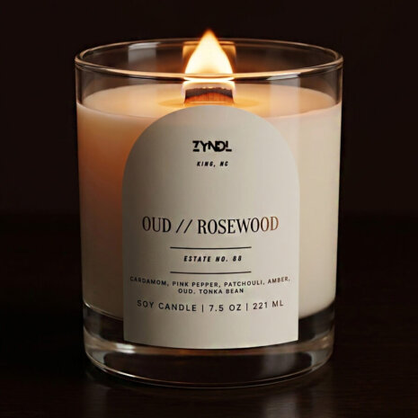 oud candle and diffuser set Burning candle with elegant label. oud candle and diffuser set