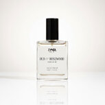 Bottle of oud and rosewood perfume
