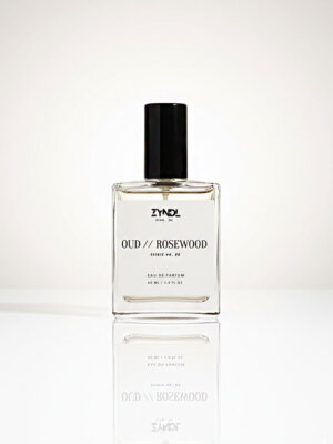 Bottle of oud and rosewood perfume
