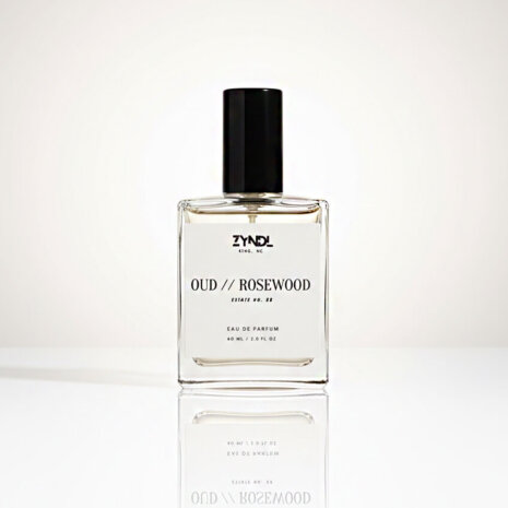 oud eau de parfum Bottle of oud and rosewood perfume