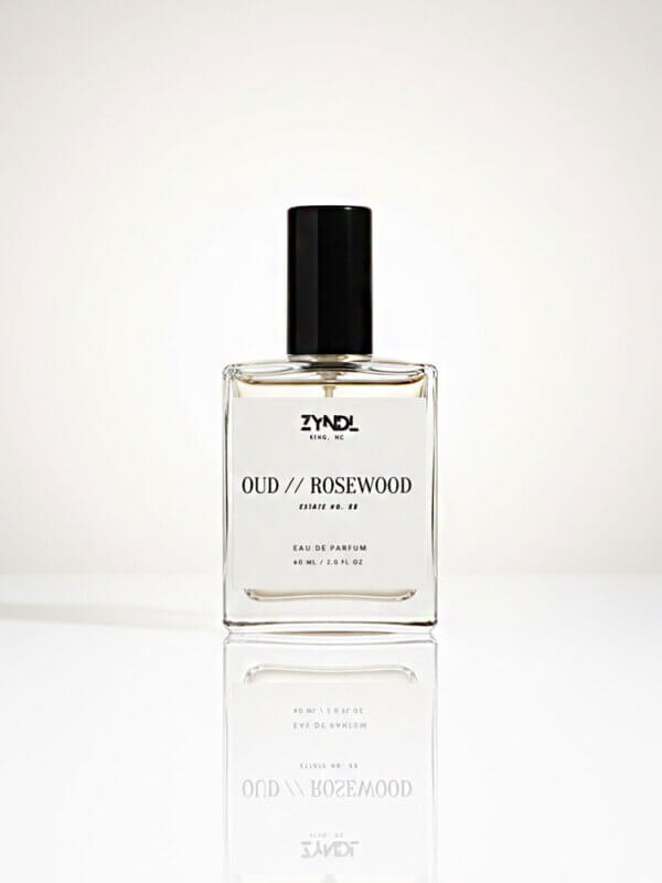 Bottle of oud and rosewood perfume