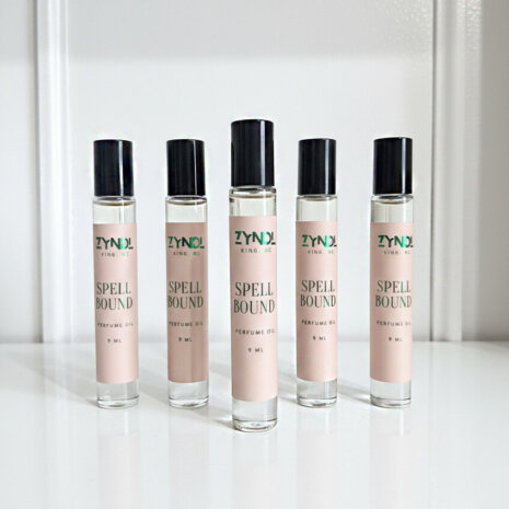 rollerball perfume Five rollerball perfume bottles displayed. rollerball perfume