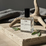 Fragrance bottle with natural elements. seaside driftwood scent air