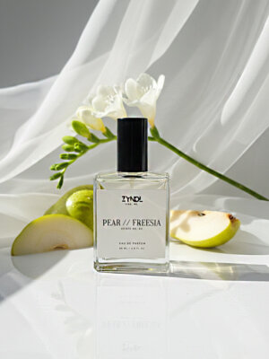 Bottle of pear and freesia perfume