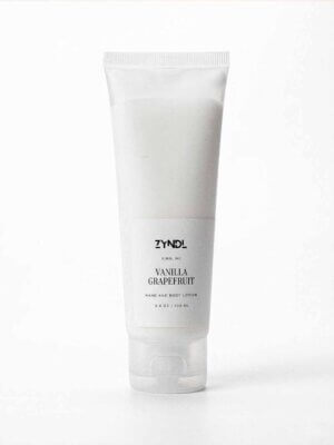 Vanilla Grapefruit Lotion grapefruit lotion tube on white background Zyndl