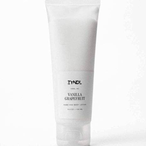 Vanilla Grapefruit Lotion grapefruit lotion tube on white background Zyndl