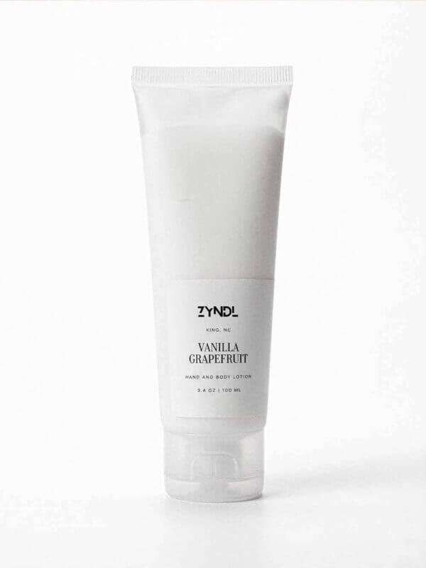 Vanilla Grapefruit Lotion grapefruit lotion tube on white background Zyndl